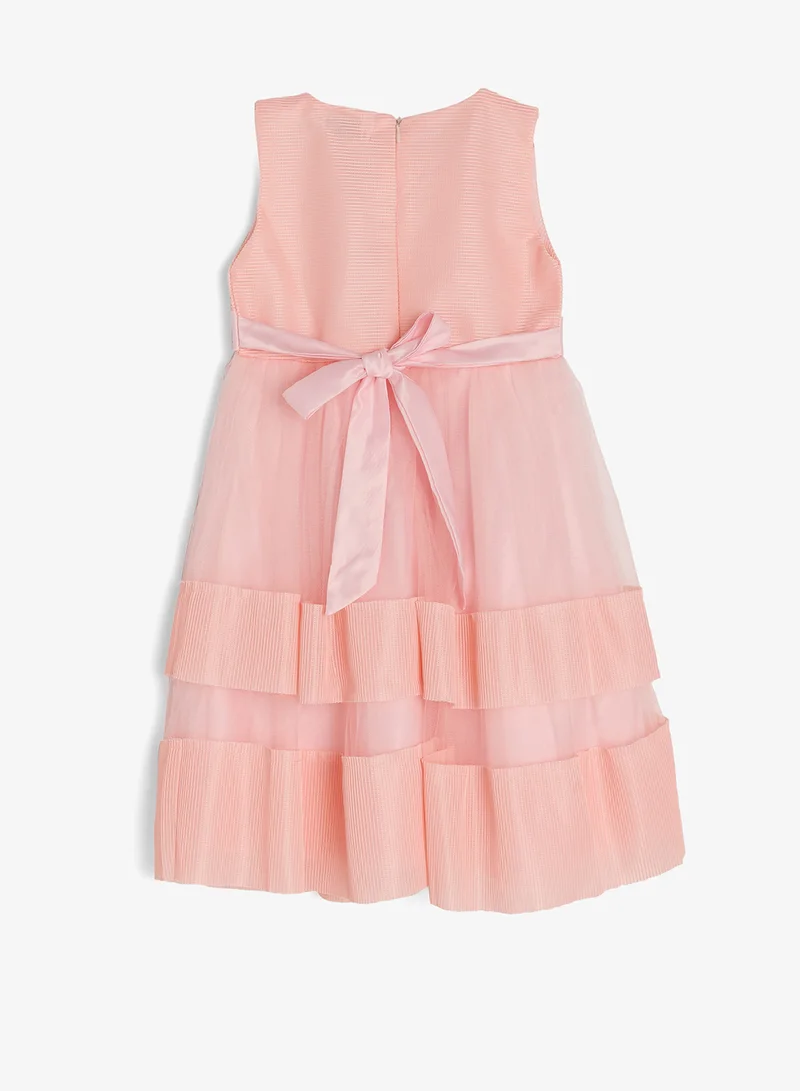 بنياتا فستان بفيونكة للمناسبات